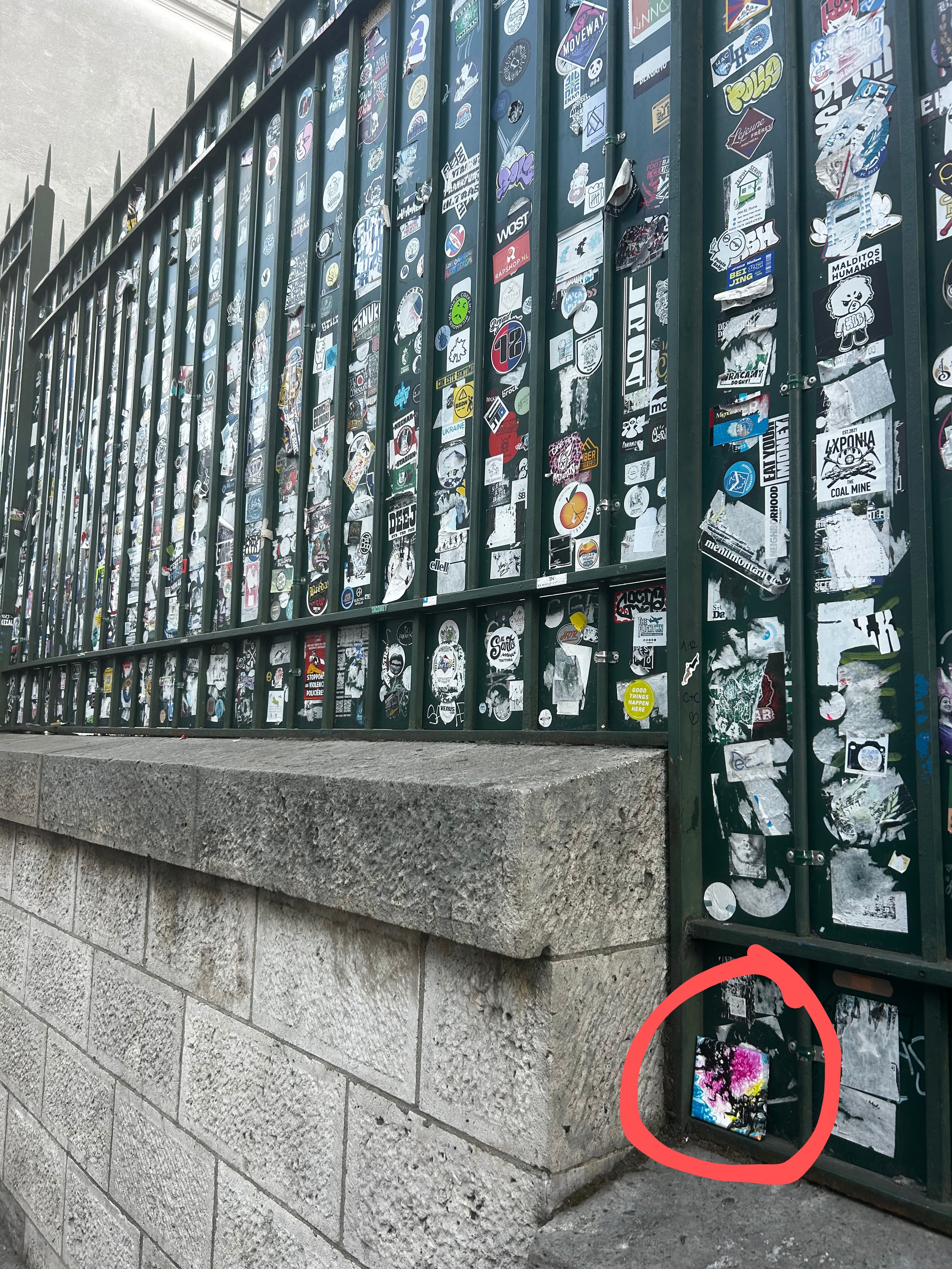 Fire Vizionz painting on the sticker fence outside Sacré-Cœur, Paris