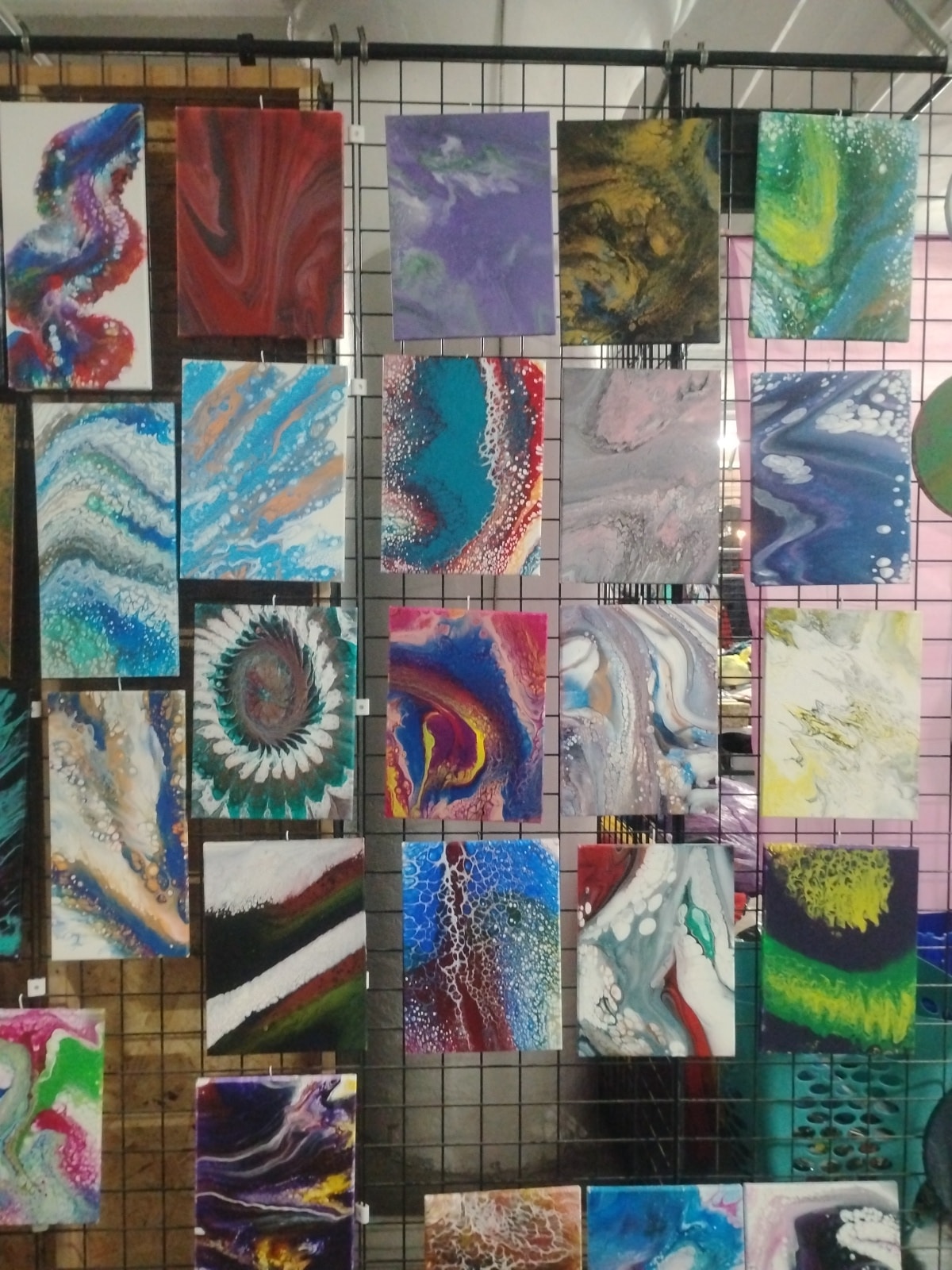 Paintings on display at Super Flea